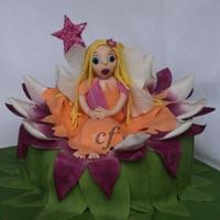 Water Lily Fairy Cake I made this cake for a customer that asked for a 3D fairy cake and left me to the design. I decided to do a fairy in a water lilly. The...