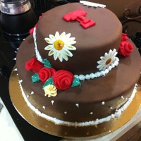 Graduation Cake Graduation cake for a friend's daughter. Chocolate cake with cookies 'n cream filling, whipped chocolate ganache, chocolate...