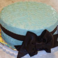 Paisley Bridal Shower This was for a bridal shower. The bride's colors were Aqua and Brown. Cake is covered in buttercream. The bow and ribbon is dark...