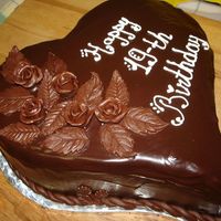 First Ganache, First Candy Clay Roses Yellow cake with cherry buttercream filling.