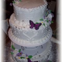Wedding Cake white cake with buttercream. gem paste flowers