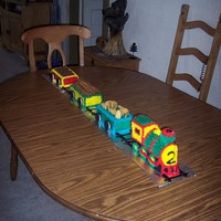 Train Cake Train cake for my sons 2nd birthday! Engine is made using the Wilton mold and all the cars are bought angle food cake. "coal" is...