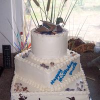 Duck, Hunting Cake 50th birthday cake. Guys nick-name was "Duck" and he liked hunting.... top layer choc. with whipped choc. ganache, middle was...