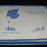 Ged Graduation Celebration 18 x 24 - 1/2 vanilla, 1/2 chocolate. Edible images. Crease happened when it was transported.