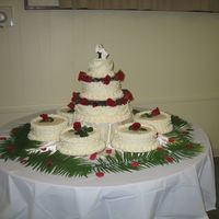 Wedding Cake A big learning experience. I was in WAY over my head on this one. All different flavors and fillings, buttercream icing and decorations....