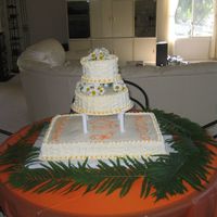 Graduation Cake Chocolate cake with chocolate mousse filling, buttercream frosting. Fresh daisies.