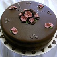 Anniversary_3.jpg Chocolate, Cherry Ripe Mudcake covered with Chocolate Fondant & Gumpaste/Chocolate decoration.
