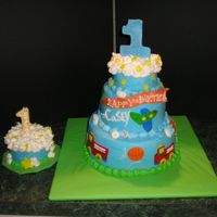 Caseys First 9/6/4 " carrot cake filled with cream cheese frosting covered in a cream cheese buttercream with fondant accents- 4" smash cake...