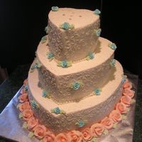 Steph Hearts wedding - 14"-10" and 6 " yellow cake, torted and filled w/ BC.colors to brides specifiications. BC with "s"...