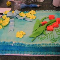 Flowers carrot cake 12x18" with CC frosting which was airbrushed- gumpaste bow and flowers