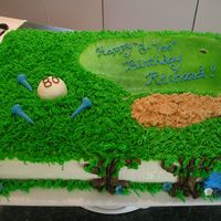 80Th 12X18" double chocolate fudge torted and filled w/bc and covered in bc with gumpaste decorations