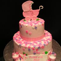 Sugar And Spice... 10" and ^' vanilla cake torted , filled and covered w/ BC. mmf slowers- real ribbon and gumpaste topper , flower pots and ribbon....