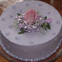 Purple Birthday Cake The cake sunk in the middle while cooling so i tried ti "build it up" with a rose and things. I also tried to paint with the...