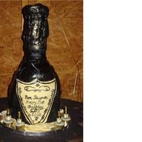 Happy 21St Birthday Thank you to farnazmom3 and pattyasken for their advice!This was about 18 inches tall; 4 tiers of 9" rounds, with a rice crispie treat...