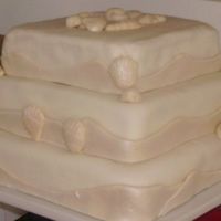 Small And Simple And Shells 3 tier square MMF covered wedding cake (and MMF shells). I really loved how this turned out...simple and elegant. Lemon cake with fresh...