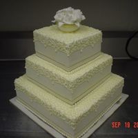 My_First__059.jpg My first wedding cake (sniff sniff). Ahh...memories!:)White Chocolate Buttermilk cake with Whipped Cream and Dark Cherries