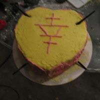 Zen Cake WASC cake with Chai Tea buttercream. Symbol on top of cake means "happiness".