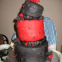 Goth Piercings Cake Chocolate mocha cake with coffee buttercream filling, wasc cake with mocha buttercream filling, wasc cake with chai tea filling.