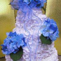 Val's Wedding Cake yes, I used a rose tip for the ENTIRE cake. Thought it was a cool effect and matched the flowers.