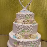 Shell Cake sea shells made of almond bark (they hold up better in this hot weather)