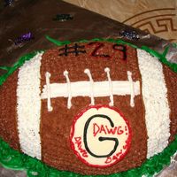 Football another football cake I made my first batch of buttercream tonite ( lemon flavor w/ 2tsp of coco powder)