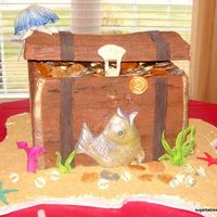 Treasure Chest for my daughters 5th birthday party with the theme of "scalawags and scales" (pirates and mermaids). triple fudge chocolate cake...