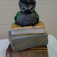 Owl And Books cake done for my first pta funtion at my daughters elementary school. humidity was a killer, and the cake started drooping. my little owl...