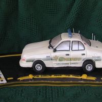 Sheriff's Car Before Touchups (Done Onsite) first car cake i've done, so i've now learned i need to charge far more, or work much faster!! i always take a pic with the flash...