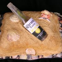 Corona Cake my first chance at experimenting with the sugar beer bottles....i was pleasantly surprised when it actually worked for me!! gumpaste lime...