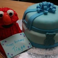 Tiago 1St Birthday Cake This cake was made for my nephew who turned 1years old and loves Elmo. Elmo is made out of fondant. Cake is Chocolate and Vanilla with...