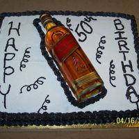 50Th Birthday This was for my dad's 50th surprise birthday. It is half chocolate/half white, all buttercream...except the scotch. : )