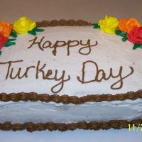 Thanksgiving Cake 2007 Chocolate and White cake with BC frosting. Any suggestions on how to get the cake crumbs off of the top of the cake would be great.