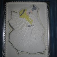 Angel Baptismal Cake 1/2 sheet with angel shaped cake on top. All white cake with whipped cream icing from sams club. silver luster dust. yellow and peach done...