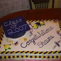 1St Graduation Cake Full sheet cake with 8" round for the hat. The top hat is cardboard square covered with fondant. The diploma is fondant. The rest is...