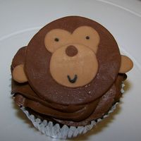 Monkey Cupcake These were for my neice's birthday...she loves monkeys. Chocolate fudge, with chocolate buttercream. Monkey is made out of fondant.