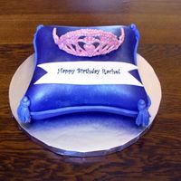 My Daughters Tiara Pillow is covered in fondant and airbrushed purple. The crown is chocolate, because my royal icing crown broke at the last minute. The...