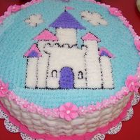 Whimsical Princess Castle made for my niece's 6th bday. Wilton BC, and 4 layer choc /yellow cake. star tech to make the picture, basketweave side, royal icing...