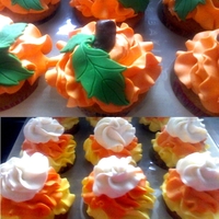 Halloween Cupcakes Vanilla cupcakes with vanilla buttercream. Pumpkin cupcakes have fondant stems and leaves. Made these for my coworkers, I think they all...