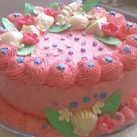 Mom's Cake Quick, last minute Mother's Day cake. Strawberry cake with strawberry Jell-O whipped cream (not easy to pipe and frost I might add)....