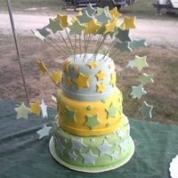 Kelsi's Birthday Cake Kelsi's 11th Birthday cake. Made stars of mmf and used gumpaste glue to stick to florist wire.