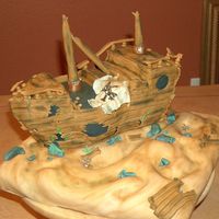 Zachary's Sunken Pirate Ship This cake was a blast and took me 2 days to complete. I wasn't very happy with the way it had initially turned out. I decided to add a...