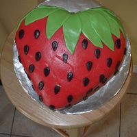 Strawberry This was my very first try at a fondont cake - using a homemade buttercream fondont (first time making that as well).