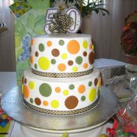 Retro Style! Did this cake for my mom's 50th birthday. Was going for a retro look. Cake is iced in buttercream and circles are fondant. This cake...