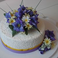 Nothing Says Happy Birthday Like Flowers! Fake flowers on buttercream iced cake