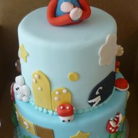 Super Mario Super Mario Cake. Almond Pound Cake, Fondant covered w/ GP accents