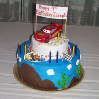 Lightning Mcqueen Cake 10" and 6" Iced and decorated in BC. Made it for my nephew's B-day!