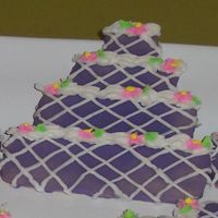 Wedding Cookie These are sugar cookies with a base cookie icing brushed on and then decorated with buttercream icing.