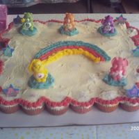 Care Bear Cupcake Cake This was my 1st cupcake cake. It was 50 cupcakes for my niece's 4th B-day. She loved it. I made it along with the elephant cake since...