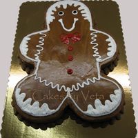 Gingerbread All Around Gingerbread Man carved out of 1/2 sheet cake and decorated in chocolate BC
