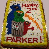 Sesame Street Gang !/2 sheet vanilla cake. All buttercream decorations in freehand drawing.(Had to look Oscar up, my children never watched SS...)